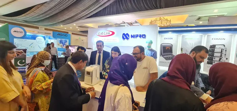 Exhibition visitors at a healthcare exhibition